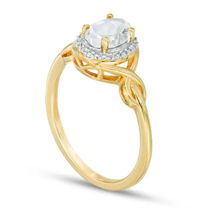 Goldia Rings Oval LabCreated White Sapphire and Diamond Accent Twist Ring in Solid 10K Yellow Gold Goldia Rings Oval LabCreated White Sapphire and Diamond Accent Twist Ring in Solid 10K Yellow Gold