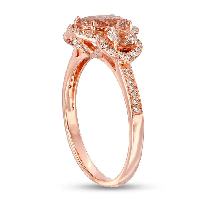 Previously Owned Oval Morganite and 020 CT TW Natural Diamond Frame Three Stone Engagement Ring in Solid 14K Rose Gold Goldia Rings Previously Owned Oval Morganite and 020 CT TW Natural Diamond Frame Three Stone Engagement Ring in Solid 14K Rose Gold Goldia Rings
