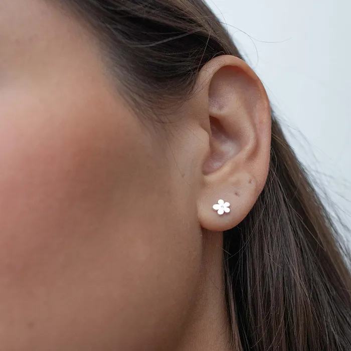 Tashi Rings Tiny Silver CZ Flower Studs